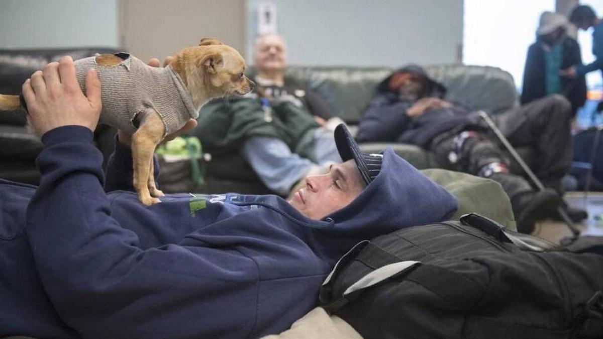 Chad Krizan relaxes in the day room at the Providence Community Care Center in downtown Olympia this month.