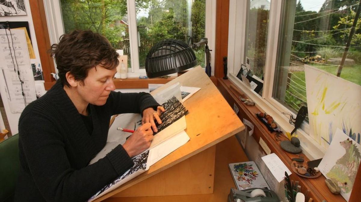 Olympia artist Nikki McClure is known for her intricate paper cuts created with an X-acto knife and a single sheet of paper.