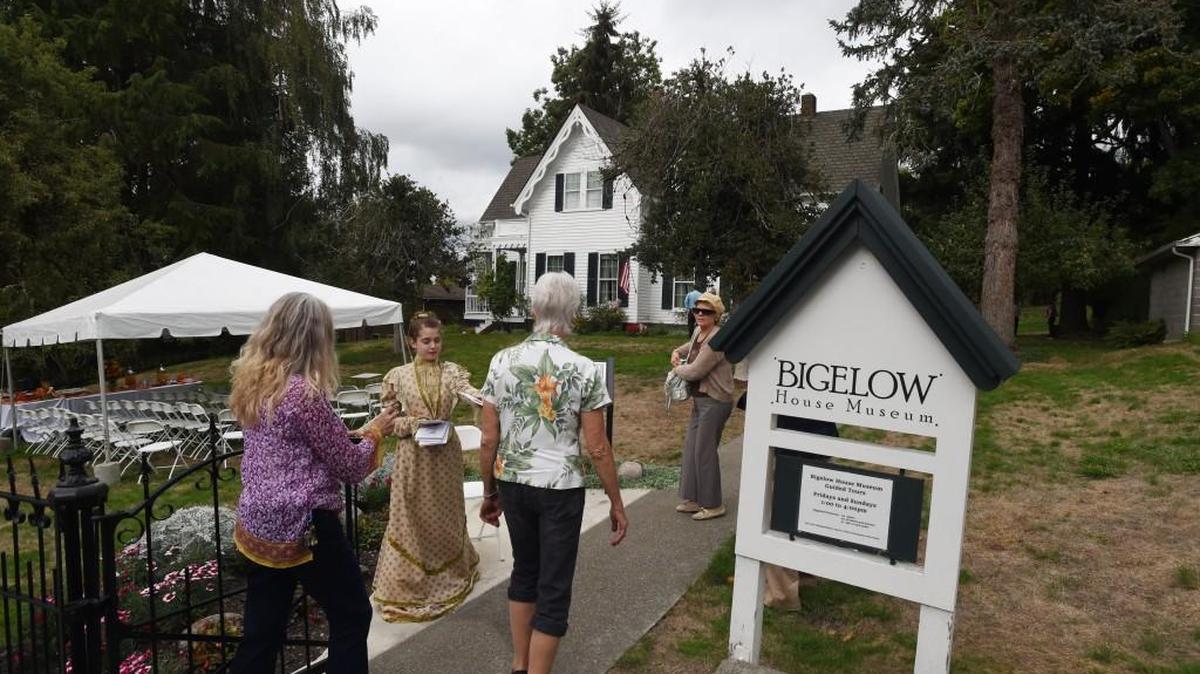 Staff file: A steady stream of visitors arrive for the Olympia Historical Society’s 20th anniversary celebration of the Bigelow House Museum Sept. 20, 2015. The museum will host the unveiling of a replica historical quilt on Sunday.