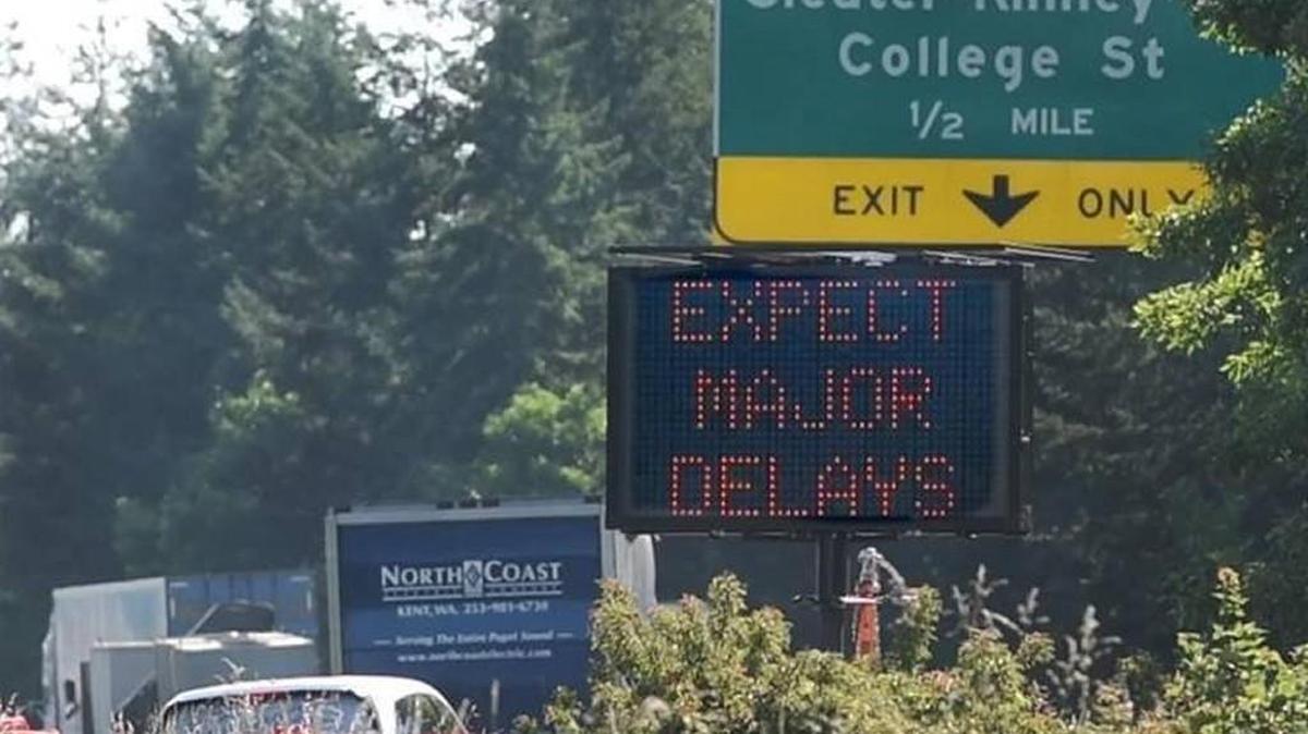 A sign on northbound I-5 near Pacific Avenue in Olympia alerts drivers to upcoming lane closures.