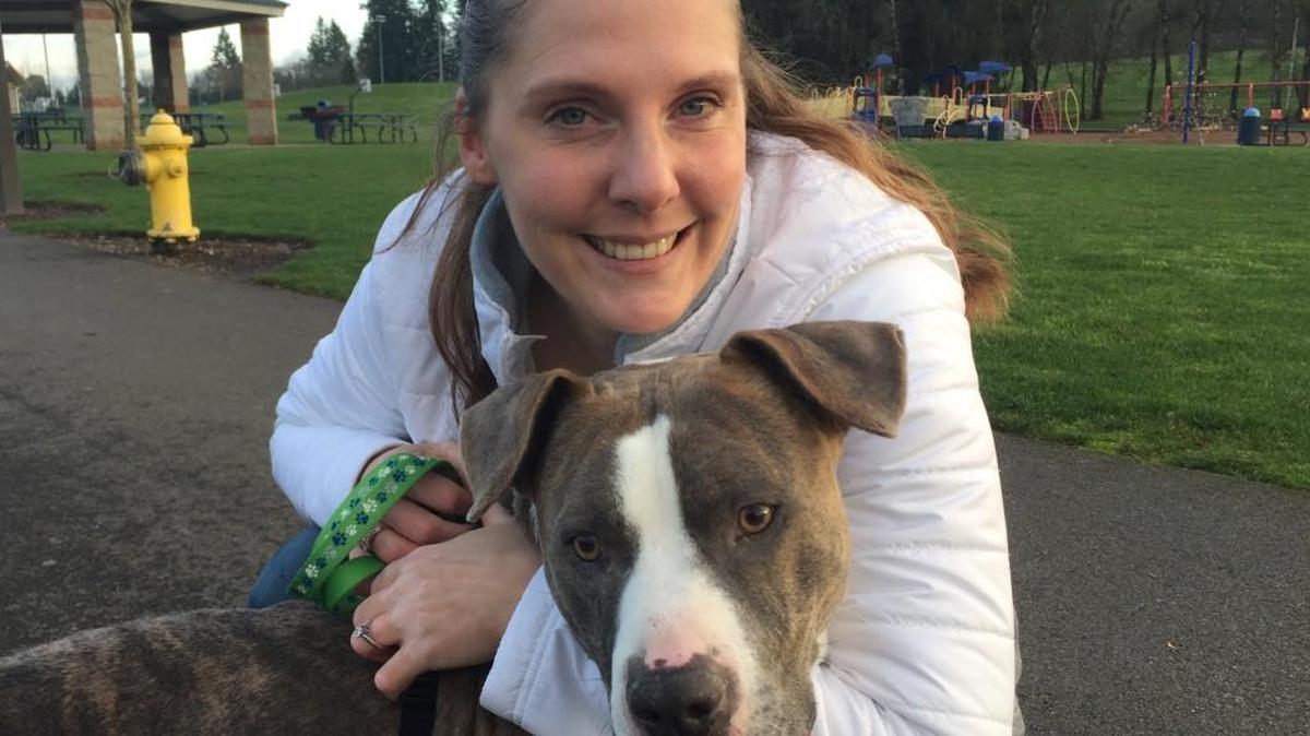 Kim Hopkins of Olympia was reunited with her stolen dog Deuce after six years on Monday. A network of 17 volunteer drivers brought Deuce more than 2,500 miles for the reunion.