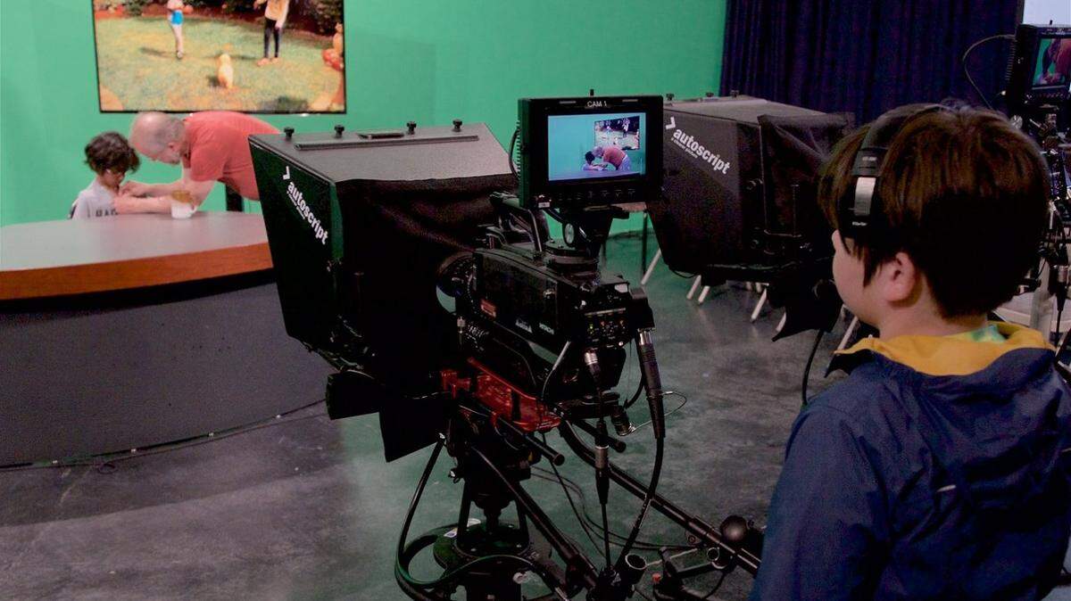 Students practice with video equipment at Thurston Community Media.