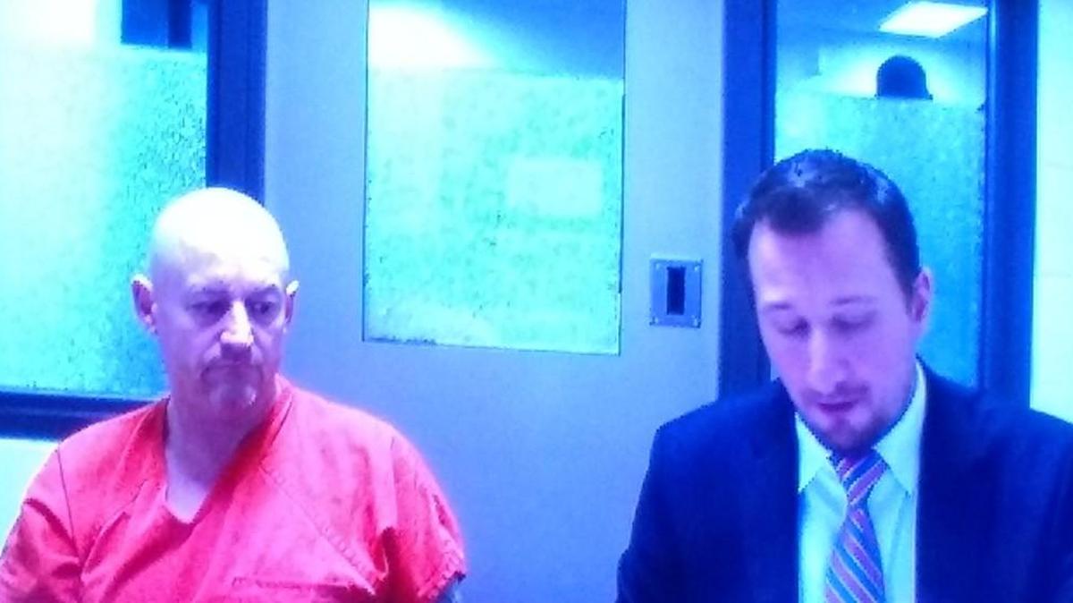 Scott Crismon (left) is suspected of shooting at a random car in Lacey during the early hours of Thursday, Dec. 21, 2017. He appeared in Thurston County Superior Court with Public Defender Eric Pilon.