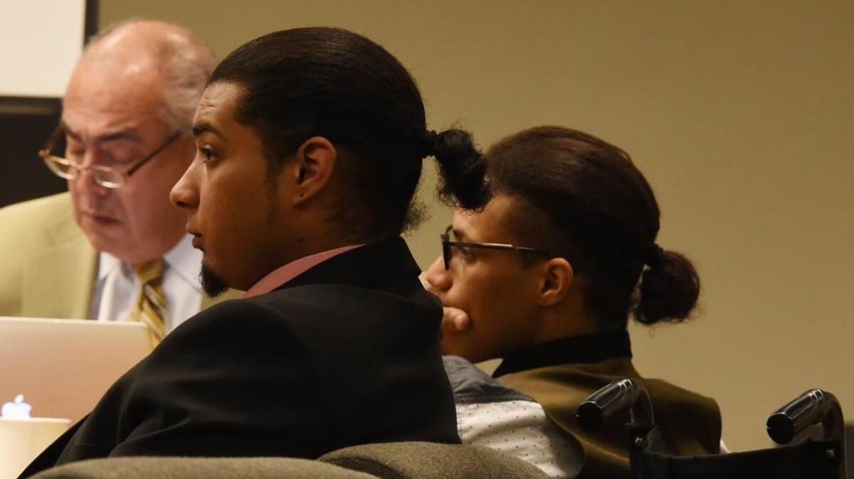 Defense attorney George Trejo along with defendants Andre Thompson and Bryson Chaplin listen during court proceedings in March.