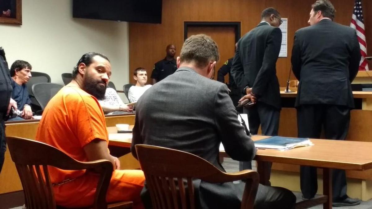 Jamel A. Soliman (left) pleaded guilty to a second-degree assault charge Wednesday in Thurston County Superior Court. He was represented by attorney Jerry Gray.