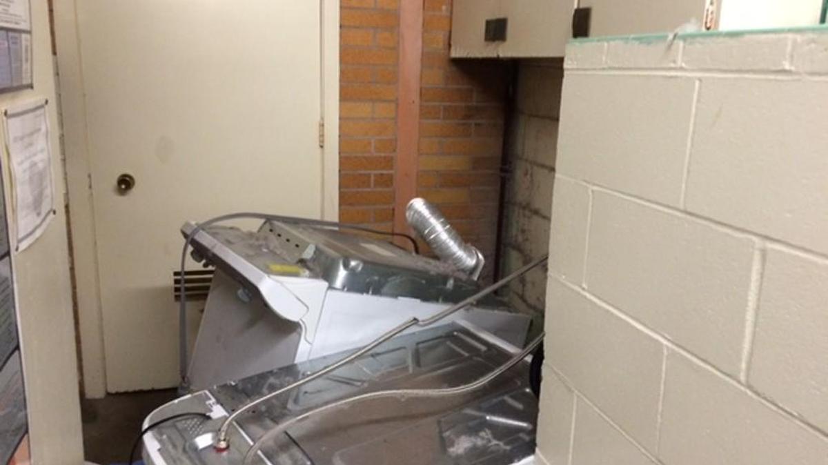 
The suspect allegedly knocked over the Olympia Veterinary Hospital’s washer and dryer after breaking in during the early hours of Wednesday, Oct. 7, 2014.
