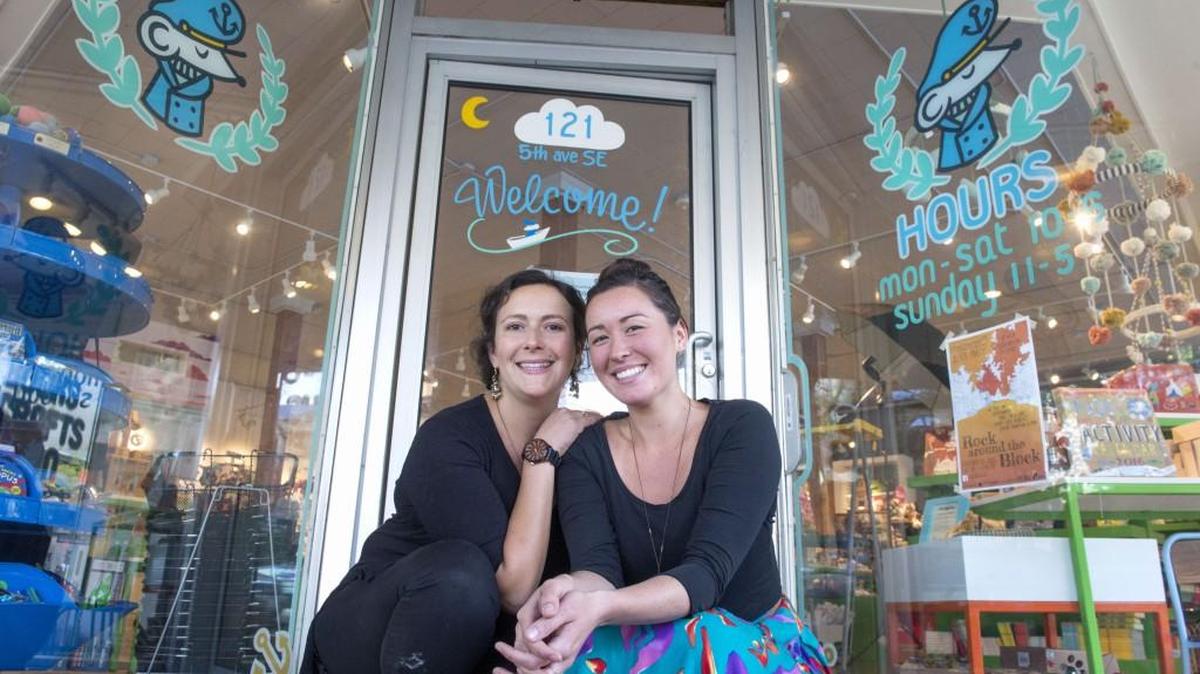 
Captain Little co-owner Alana Carr, left, and employee Amanda Crowson support the Safe Olympia program, in which local businesses designate their stores as havens for LGBTQ victims of hate crimes. Carr said the toy and bookstore has always tried to create a welcoming environment. "We want to be a safe and open space and foster that sense for the community. We're all on the same team."
