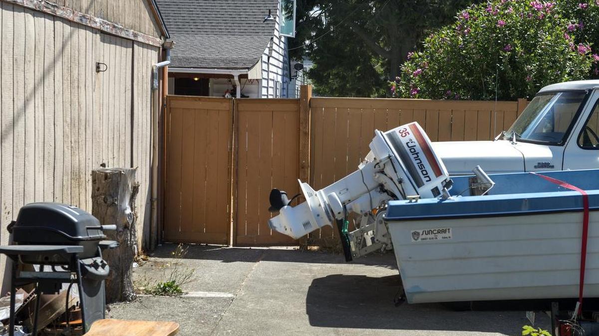 
Police say a man unlatched this gate from outside and attempted to drag away 2-year-old girl who had been playing in the back yard. Her screams attracted her sisters, who scared the man away. The gate is now locked. 

