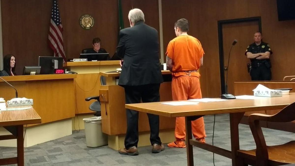 Daniel B. Rowe (in orange) pleaded guilty Tuesday, Oct. 24, 2017 to assault and malicious harassment charges, in connection to a 2016 stabbing hate crime in downtown Olympia. He was represented by attorney Robert Quillian (to his left) and made the plea before Thurston County Superior Court Judge Mary Sue Wilson.