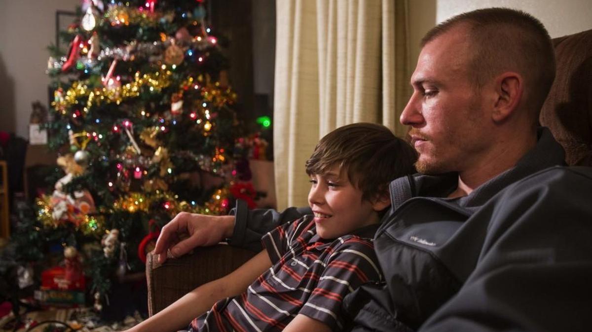 10-year old Kaden, left, knows his father, David Jennings, may have to return to jail to serve three months due to a mistake made by the state, having already served 10-years. Despite having served nearly his entire prison term, David Jennings is being ordered back to jail for three additional months due to the state's error in calculating his sentence. Jennings had been narrowing in on starting his own business. Now, those monies may go toward his legal bills.