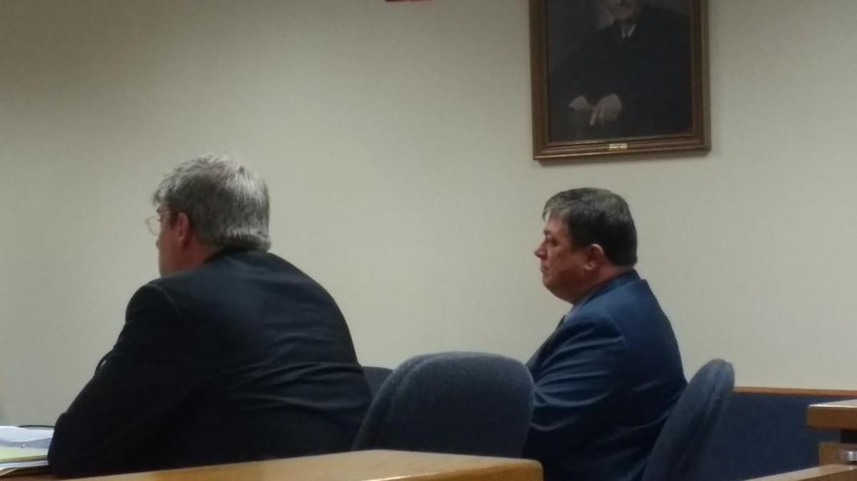 Jimmy Wall, right, in Thurston County Superior Court with his attorney, Wayne Fricke, in 2017. Wall’s trial ended in a mistrial.