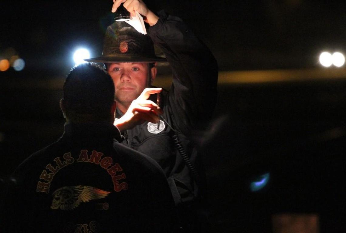 Washington State Patrol Trooper Guy Gill performs a field sobriety test on the side of Interstate 5 on Dec. 22, 2012.