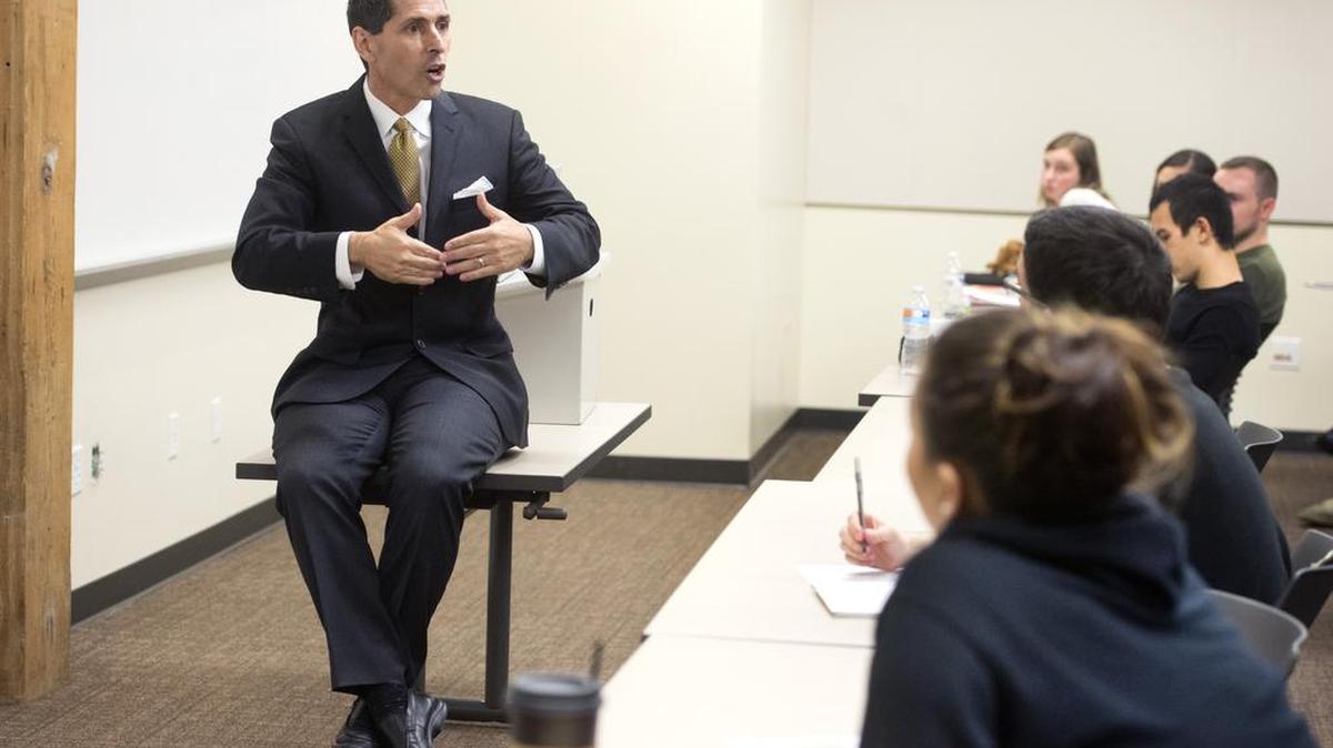 
Michael Santos, who spent 26 years in prison, describes the sensation of sitting on the bunk in his cell, while speaking to a class at UWT on Oct. 7. 
