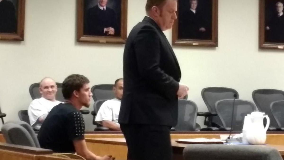 Canaan Capo (left) appeared Wednesday in Thurston County Superior Court with public defender Luke Swinney.