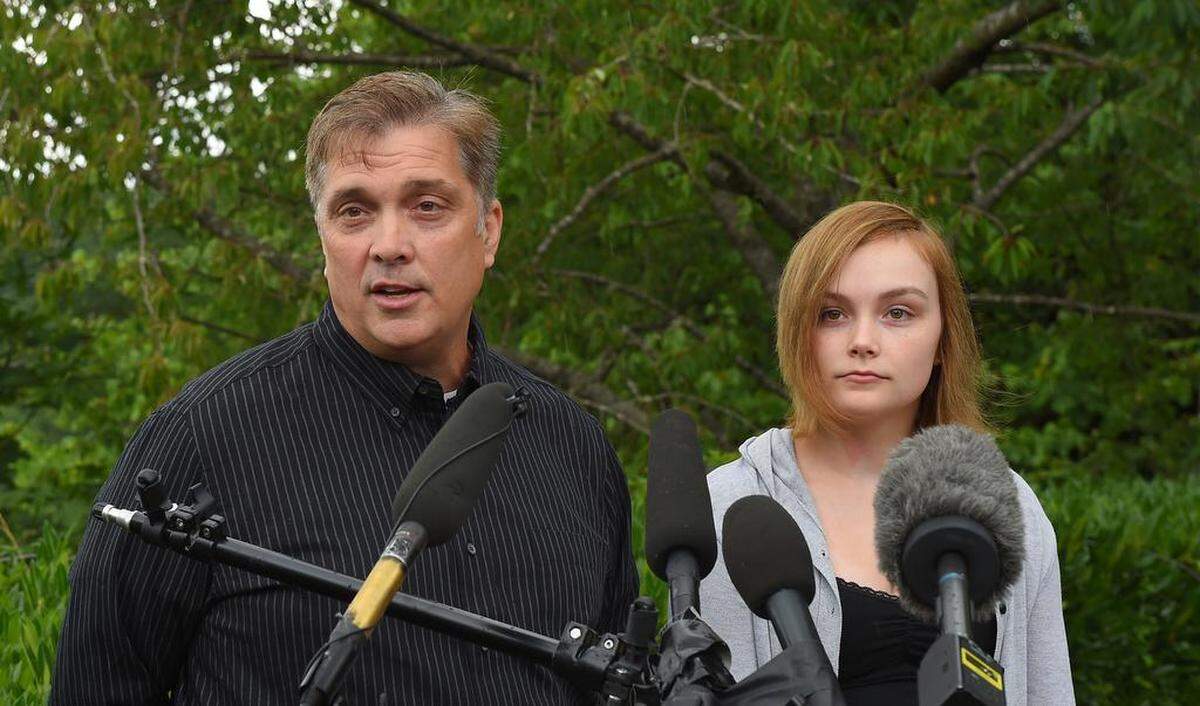 Nancy Moyer’s estranged husband Bill Moyer and their daughter Samantha speak at a July 11 press conference following the arrest of Eric L. Roberts.