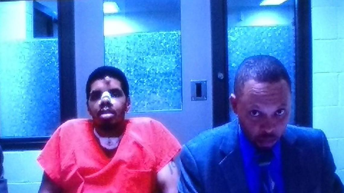 Ricardo Gardin-Gonzalez (left) appeared in Thurston County Superior Court with Public Defender Larry Jefferson on Aug. 28, 2017.