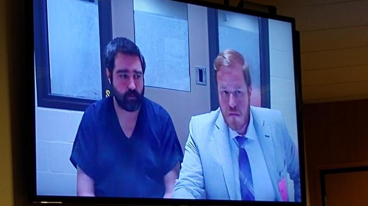 Ryan Parker, left, appears in Thurston County Superior Court on Thursday on a first-degree rendering criminal assistance charge. His bail was set at $100,000 and he was ordered to have no contact with Amara Lundy.