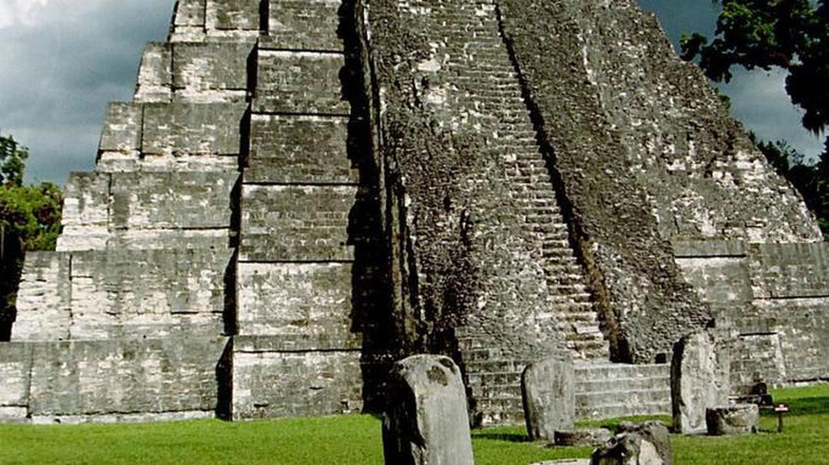 Temple I at Tikal was built to hold the tomb of the great Ah Cacau, whose son began construction after his father’s death in 721 A.D. The pyramid is topped by a three-room temple that was painted in bright colors.