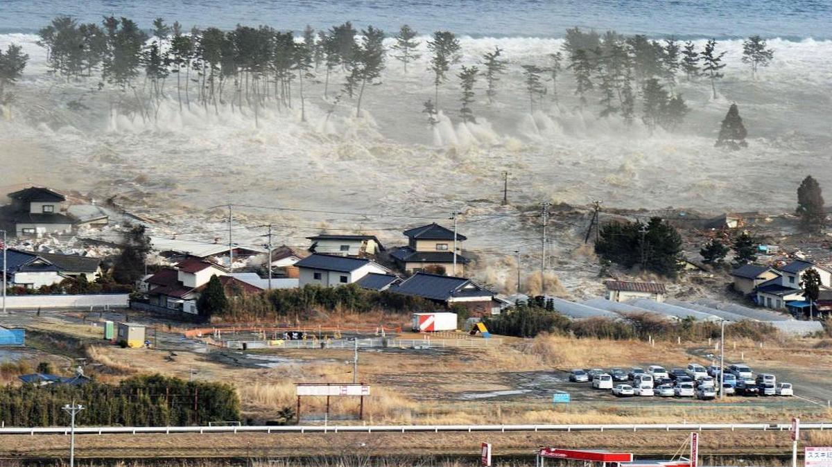 Waves of tsunami hit residences after a powerful earthquake in Natori, Miyagi prefecture, Japan, on March 11, 2011. It was the largest earthquake in Japan's recorded history.