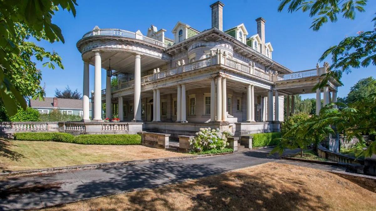 The original Rust Mansion, shown in 2015, was designed by Ambrose Russell.