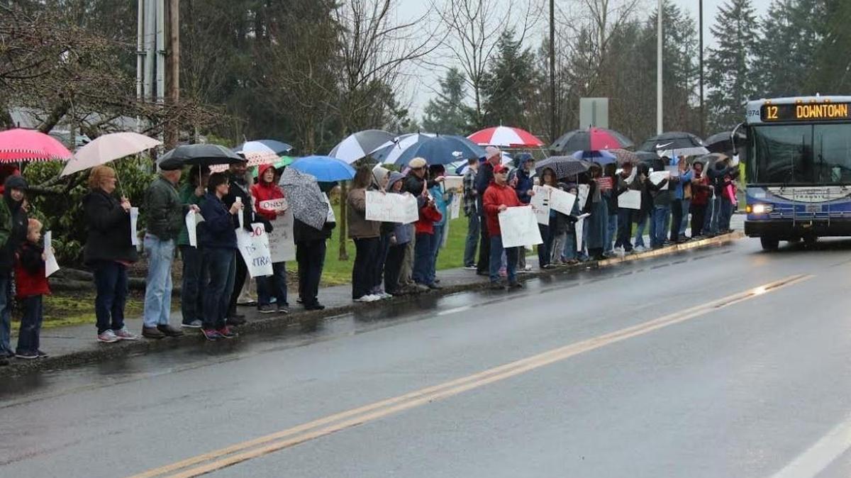 Tumwater teachers hold an informational picket outside school district headquarters on Friday, March 4, 2016. They also picketed before the Tumwater School Board meeting on Thursday, March 10.