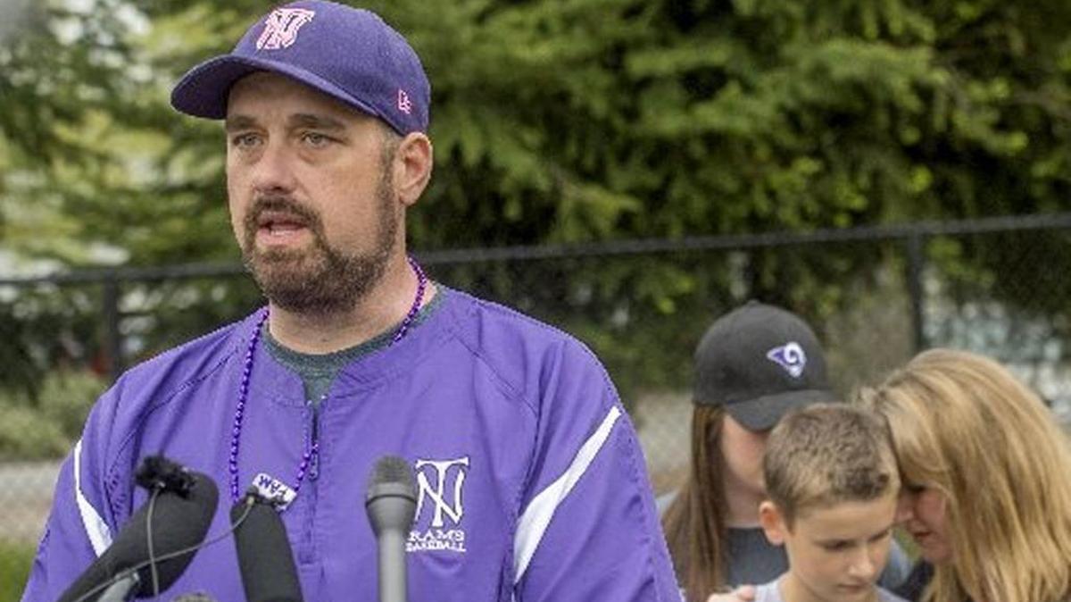 Olympian file photo: Brady Olson, a teacher from North Thurston High School who tackled a boy firing a gun in the school, speaks to the media on April 28, 2015. Olson is the guest speaker at “Compassion is Contagious” community forum on Saturday.