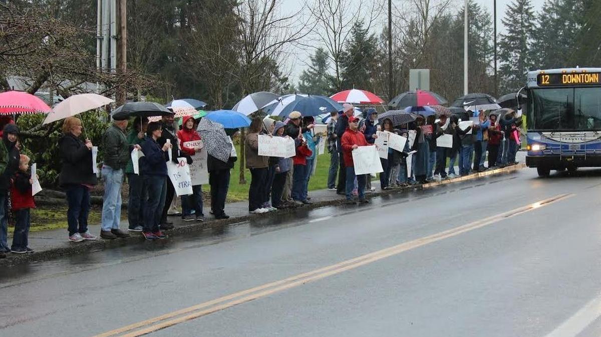 Tumwater teachers stage an informational picket outside school district headquarters March 4. The union and district have agreed to apply for mediation services due to a stalemate in contract negotiations.
