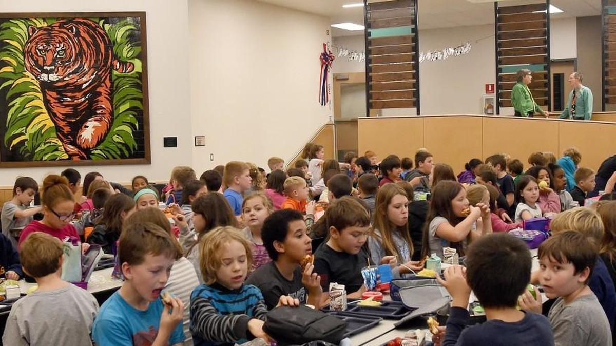 Displayed in the cafeteria and over seven-feet tall and made up of 400, 4x4 inch tiles glazed by students, staff and PTO members a colorful tiger artwork which represents the school mascot watches over Littlerock Elementary School students during their Nov. 2nd lunch. The school was closed early on Friday due to water issues.