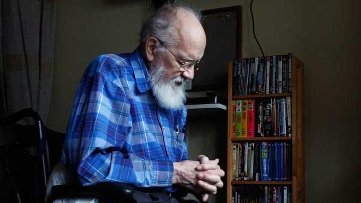 Father Alfred Hulscher sits quietly in his room at the Providence Mother Joseph Care Center in Olympia in March 2015. Hulscher underwent heart-valve surgery that prevented him from returning to the Saint Martin’s Abbey. He died late Thursday after about a week in hospice care.