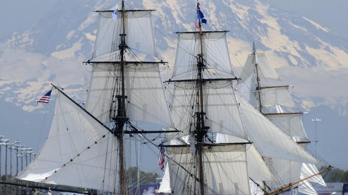 The Lady Washington is among the ships attending this year’s Festival of Sail. She’s pictured firing one of her cannons during a mock duel with The Hawaiian Chieftain during Tall Ships Tacoma.