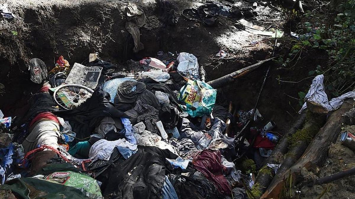 Olympia local resident Jim Rainwood documents the homeless camps and debris March 3 along the Olympia Woodland Trail. He provides information from his monthly treks to the city code enforcement staff.