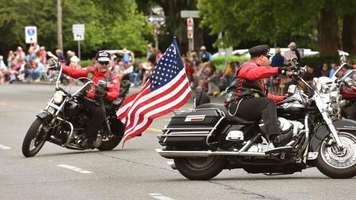 Always a crowd favorite, the Tenino Motorcycle Drill Team runs through their routine along Capitol Way July 4th during the annual City of Tumwater Independence Day Parade. This year's theme is "Like Totally '80s." The parade begins at 11 a.m. July 4 downtown Tumwater.