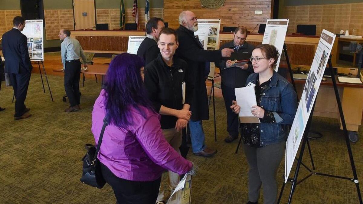 A lunchtime crowd stops by City Hall on Thursday to look at proposed changes for four of the busiest streets in downtown Olympia. There will be another open house from 5:30 to 7 p.m., also at City Hall.