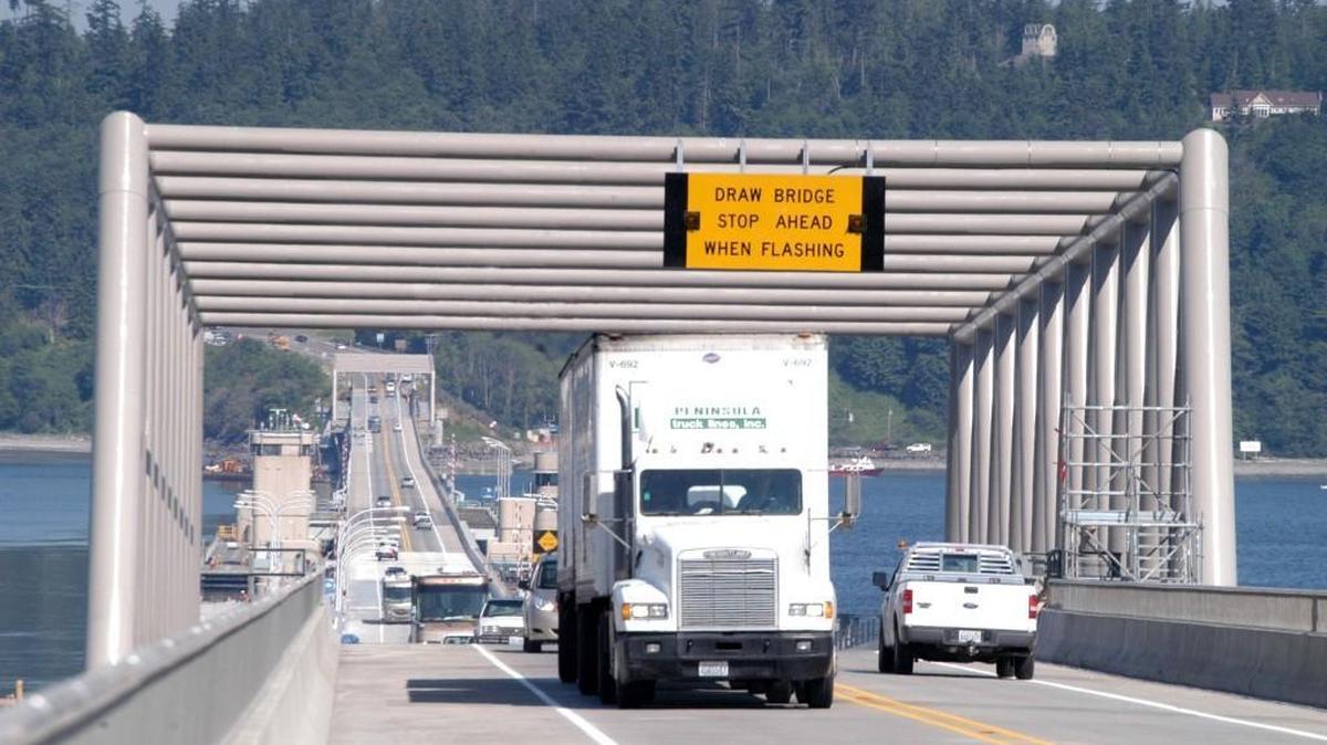 
FILE PHOTO: Traffic makes its way across the Hood Canal Bridge near Shine. The bridge was closed Wednesday because of a malfunction.
