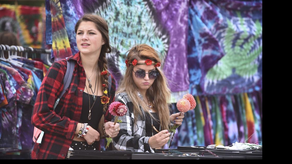 
Taylor Riordan, left, and Amy Zagrean, both of Shelton, look over jewelry on sale during the annual Olympia Hempfest at Heritage Park in downtown Olympia on Saturday, July 25, 2015.
