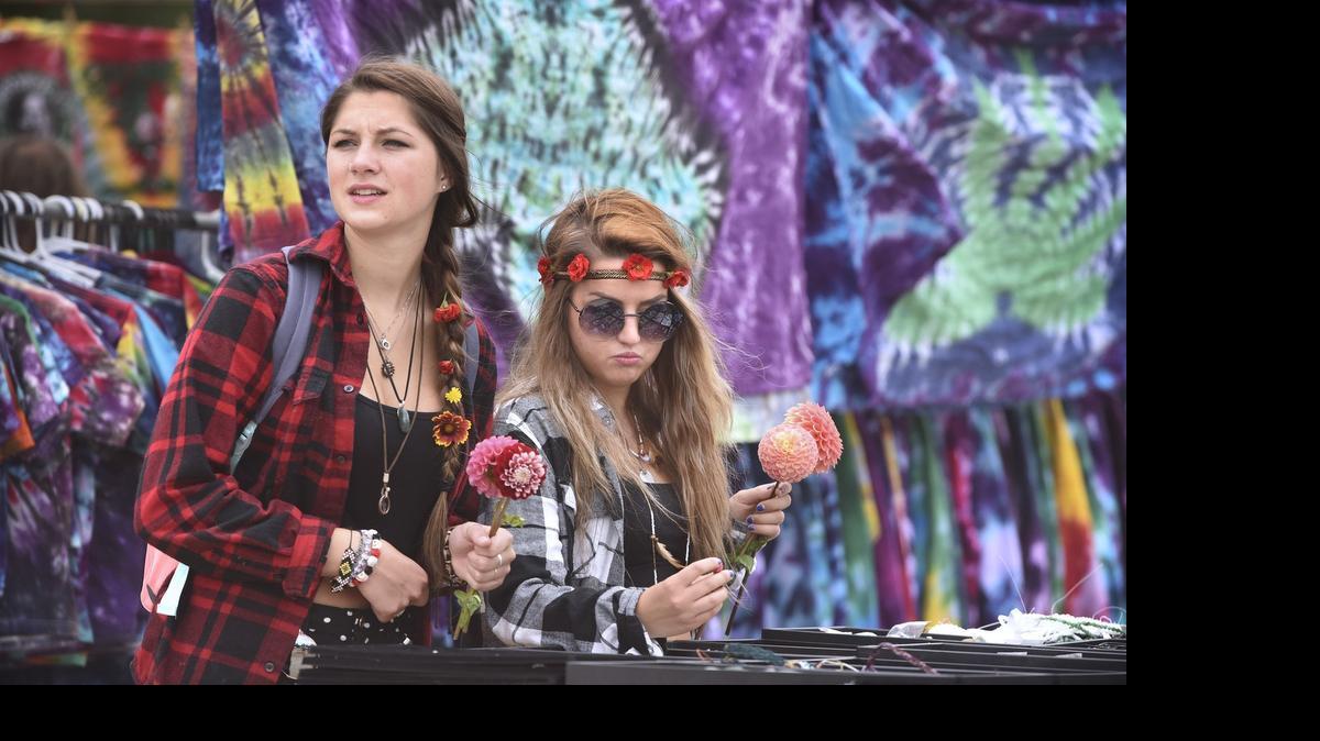 
Taylor Riordan, left, and Amy Zagrean, both of Shelton, look over jewelry on sale during the annual Olympia Hempfest at Heritage Park in downtown Olympia on Saturday, July 25, 2015.
