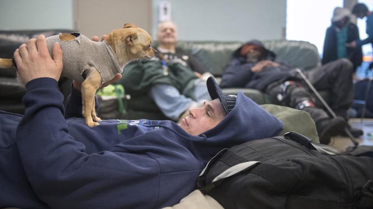 Chad Krizan relaxes in the day room at the Providence Community Care Center in downtown Olympia this month.