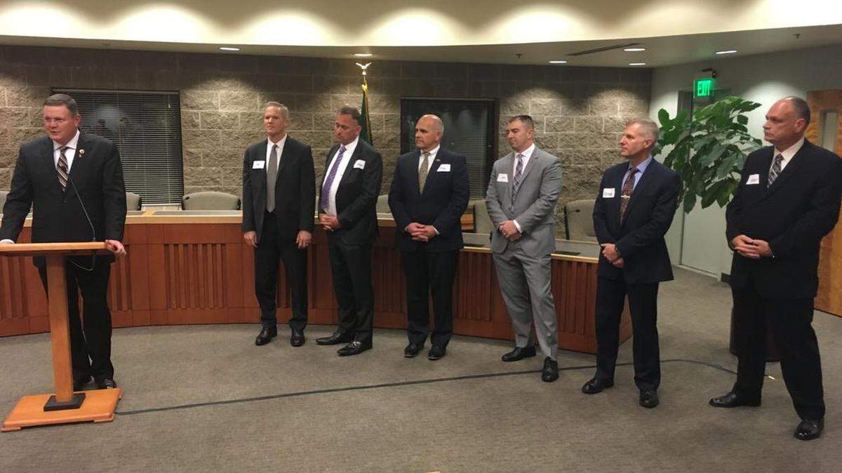 The six finalists for Lacey police chief (from left): Ken Semko, interim police chief for the city of Santa Monica; Ron Schaub, Pierce Transit public safety chief; Tim Braniff, Thurston County Undersheriff; Dan Yourkoski, Normandy Park police chief; Craig Schwartz, a captain in the city of Santa Rosa, California police department; Carl Nielsen, Centralia police chief. All of them were introduced by Mike Painter (far left) of the Washington Association of Sheriffs and Police Chiefs.