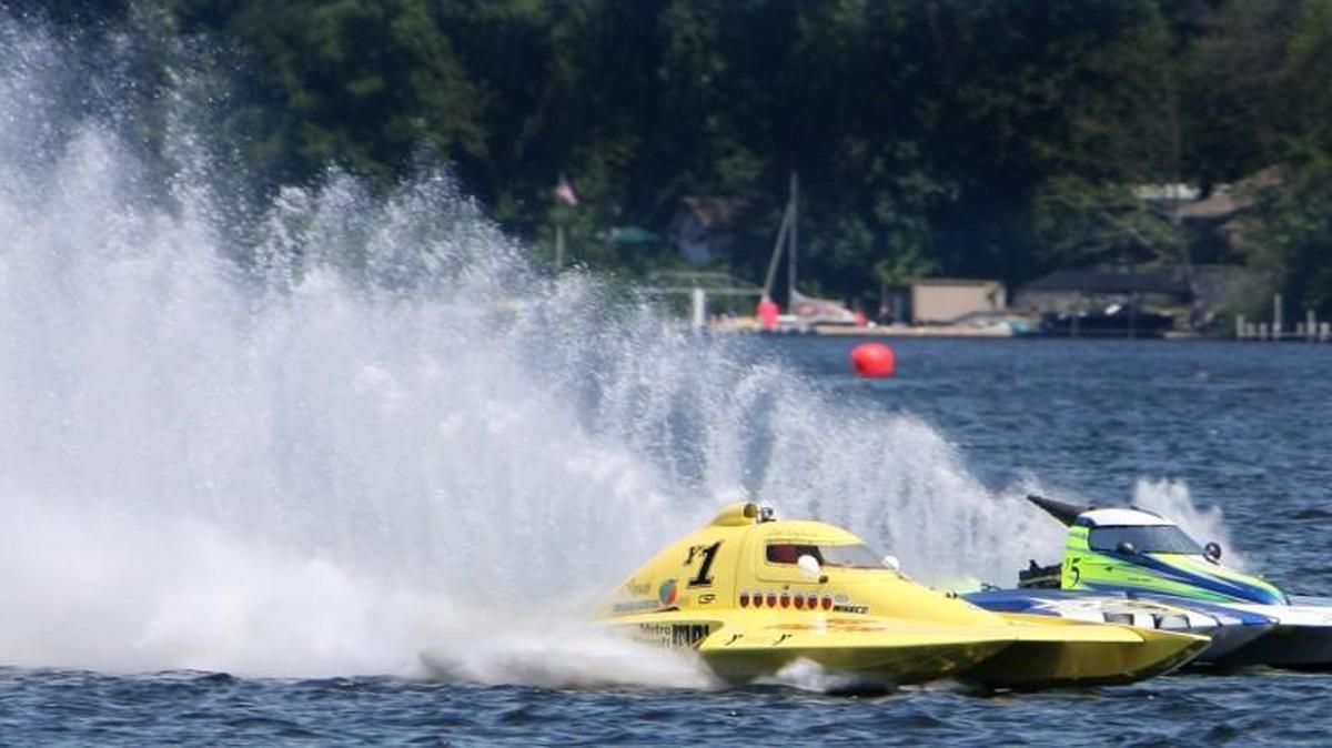 FILE PHOTO: The Yi and Y5, 1.5-liter hydroplanes race deck to deck during their first heat of the day at the annual Black Lake Regatta in 2012. The races return to Black Lake this weekend.