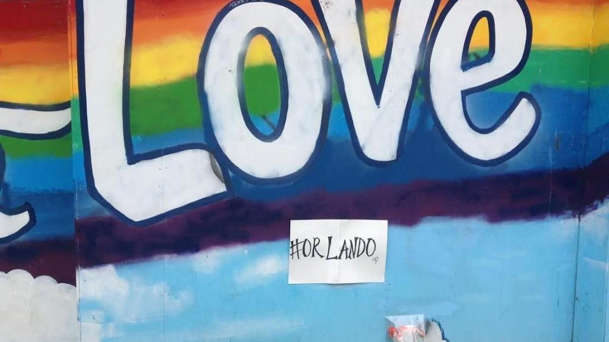 A memorial sprouts on downtown Olympia’s Fourth Avenue East after the mass shooting in Orlando, Florida.