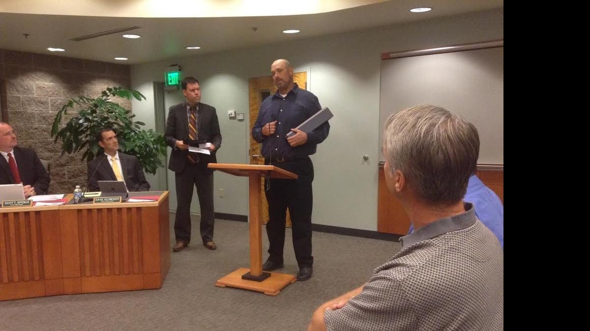 
North Thurston High School teacher Brady Olson addresses the council and audience after receiving the Spirit of Lacey award during Thursday night’s Lacey City Council meeting.
