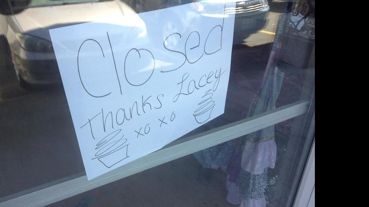 
A sign on the door of the Bonjour Cupcakes’ location in Lacey reminds customers that it is no longer in business. The Olympia location on Capitol Way also has closed. 
