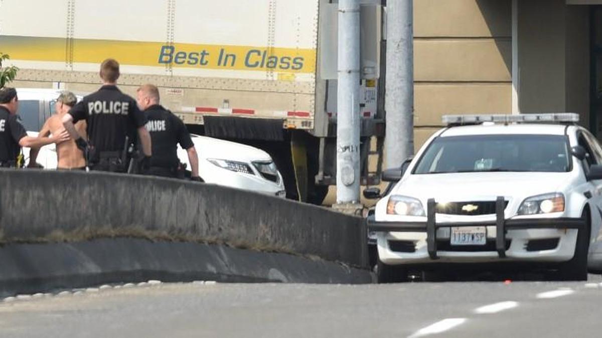 A man who apparently threatened to jump off the Custer Way overpass in Tumwater Sunday morning resulted in the temporary closure of Interstate 5 in both directions.