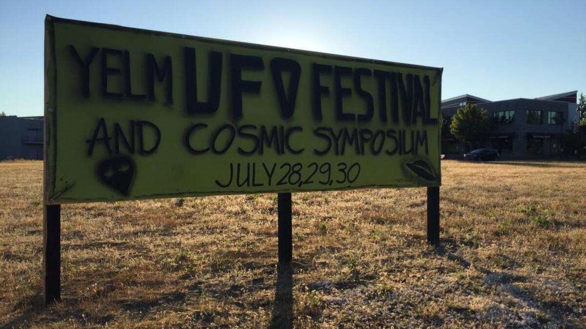 An alien sign welcomes people to this weekend’s Yelm UFO Fest.