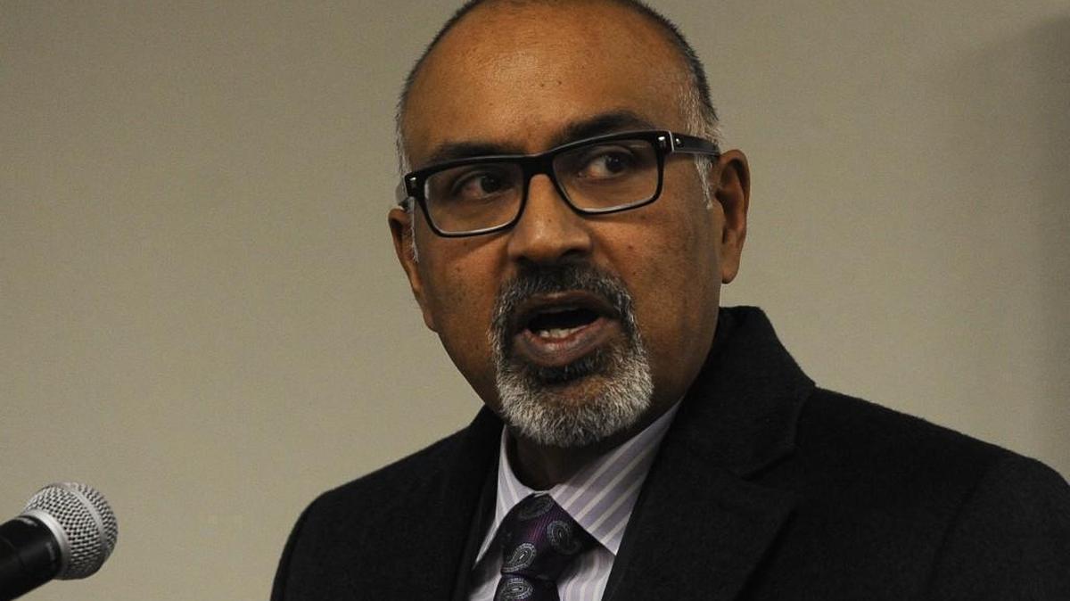 Daryl Rodrigues, director of the Office of Assigned Counsel, answers a citizen's question during the Thurston County Commissioner's Monday hearing on the proposed $330 million budget.