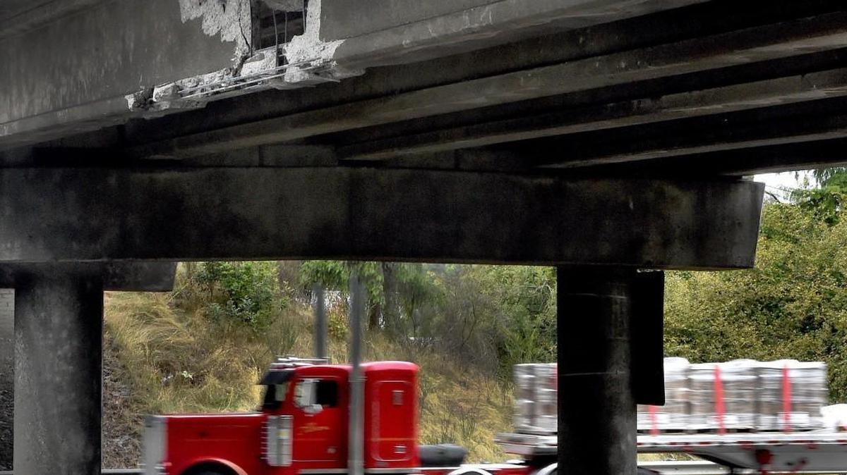 Interstate 5 morning traffic moves smoothly northbound under the 93rd Avenue SW freeway overpass after an overheight load struck it around 2:25 a.m. Sept. 13, 2015.