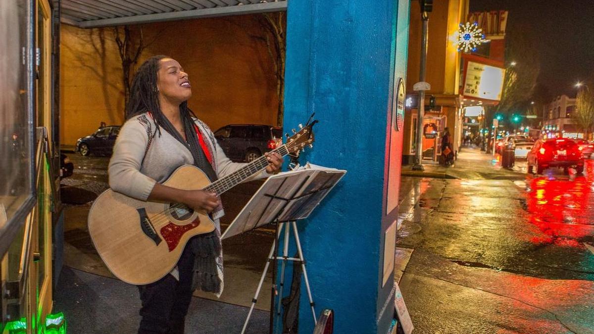 Buskers perform on the streets of downtown during the monthly Third Thursday event.