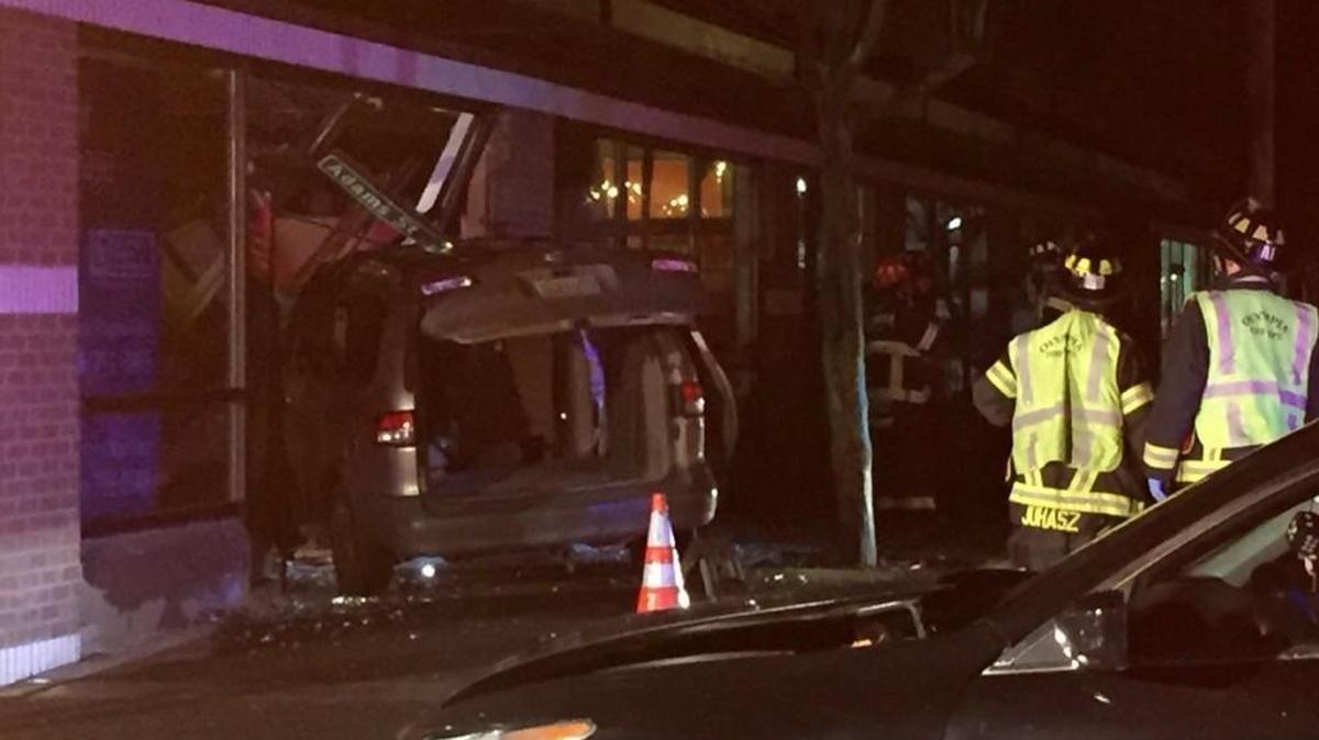 A vehicle drove into a mixed-use building at Fifth and Adams on Friday evening.