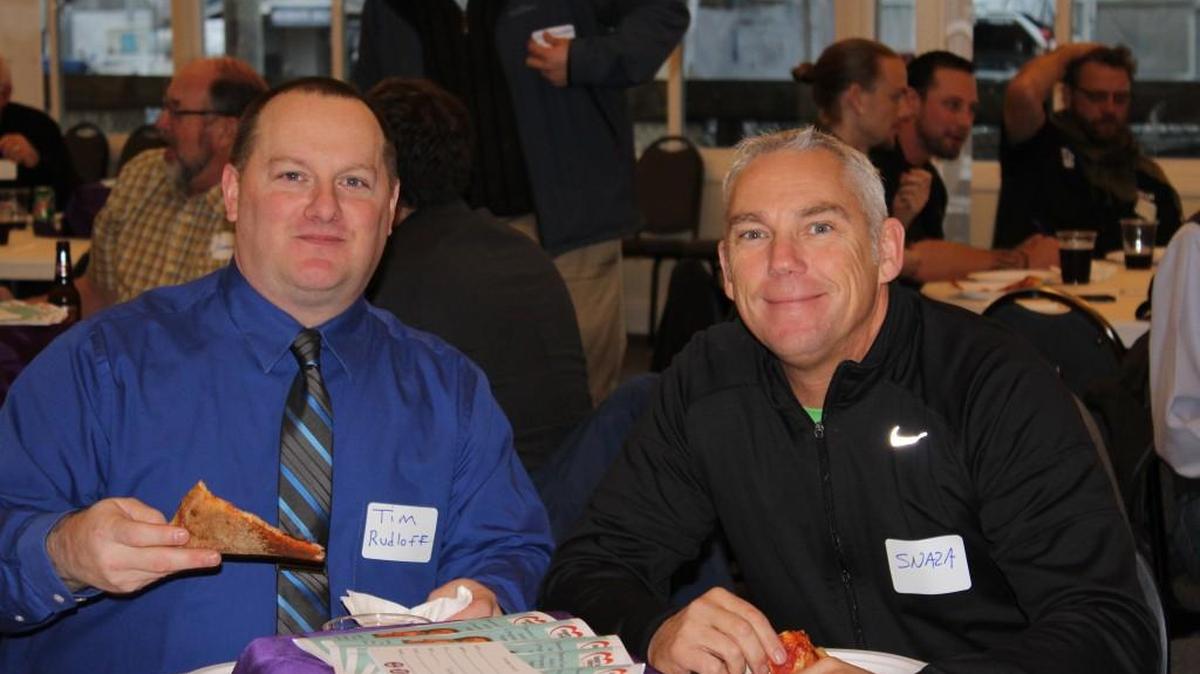 Detective Tim Rudloff and Sheriff John Snaza attended the 100 Men Who Care About Domestic Violence fundraiser Thursday at the Olympia Yacht Club.