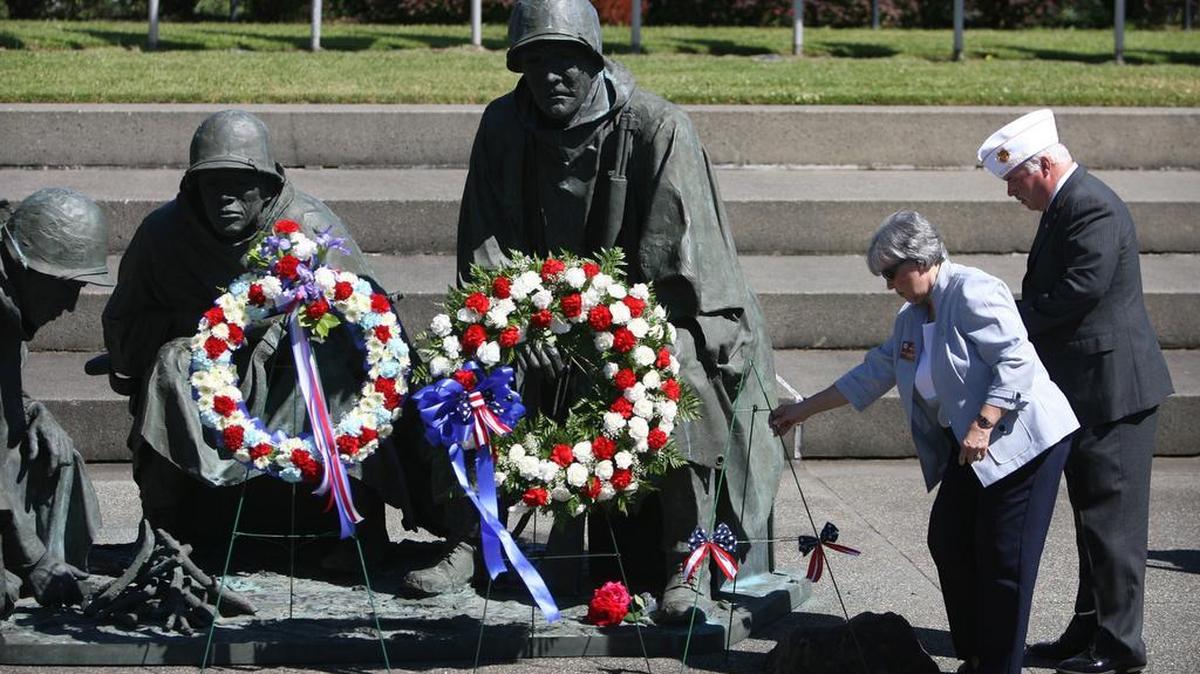Representatives from veterans groups placed wreaths at the Korean War Memorial on the East Capitol Campus in Olympia on Saturday, July 24, 2010.